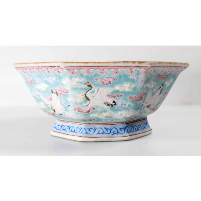 We are selling this gorgeous Chinese turquoise famille rose low bowl. This octagonal bowl has traditional form with sides...