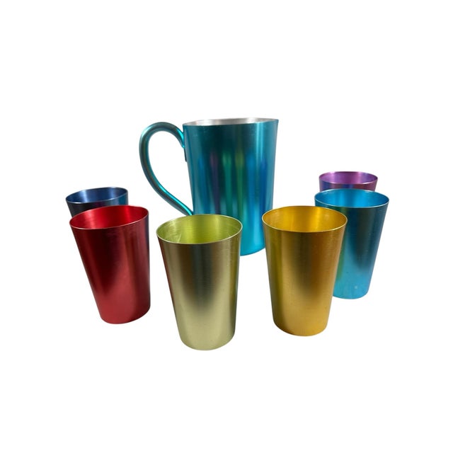 Beautiful set of aluminum picture and glasses all the colors of the rainbow Very rare in this condition