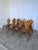 Vintage wooden dining chairs in traditional Tyrolean (Alpine) style. with a shaped backrest and characteristic heart cut-...