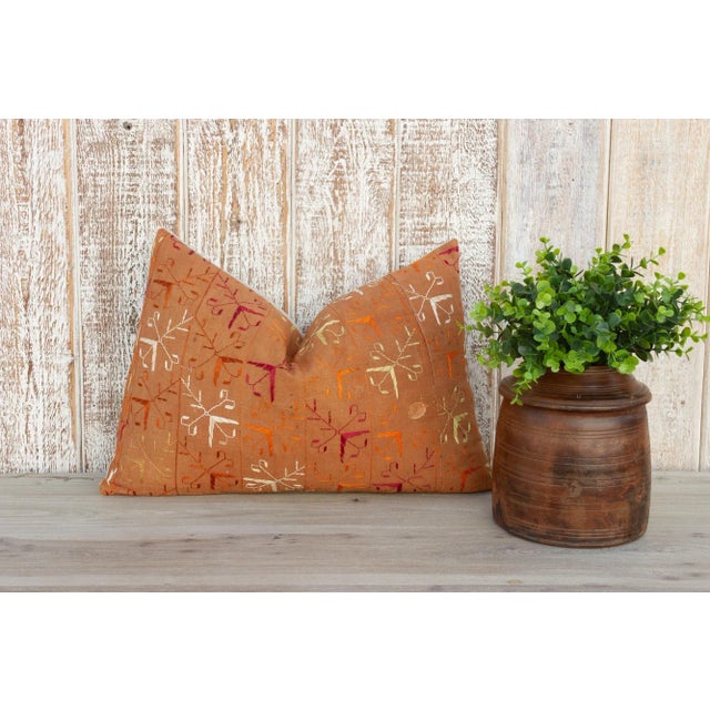 This colorful and luxurious Bagh Phulkari pillow features beautiful hand-done silk embroidery on top of a cotton fabric....