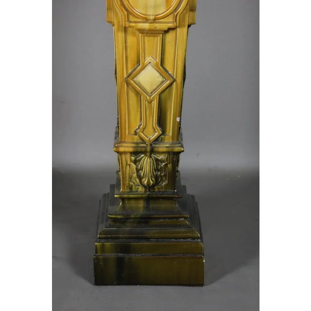 20th century earthenware saddle. We point out minimal bursts. Dimensions: 1m in height and the tray is 23cm x 23cm