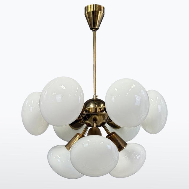There are two of these chandeliers. Manufacturer: Kamenický Šenov, This chandelier nine intact glass lampshades. The...