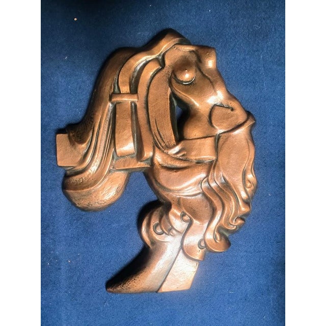 Naval Decoration "Art Deco Nude" Unsigned. 1970s This is a relief depicting a stylized female nude, blending Art Deco...