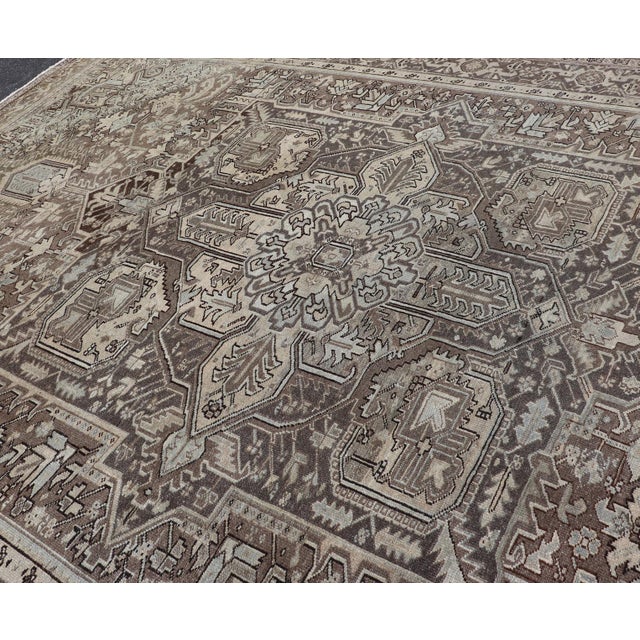 Measures: 9'4 x 13'0 Antique Persian Heriz Rug with Geometric Medallion and Soft Neutral Tones. Keivan Woven Arts/...