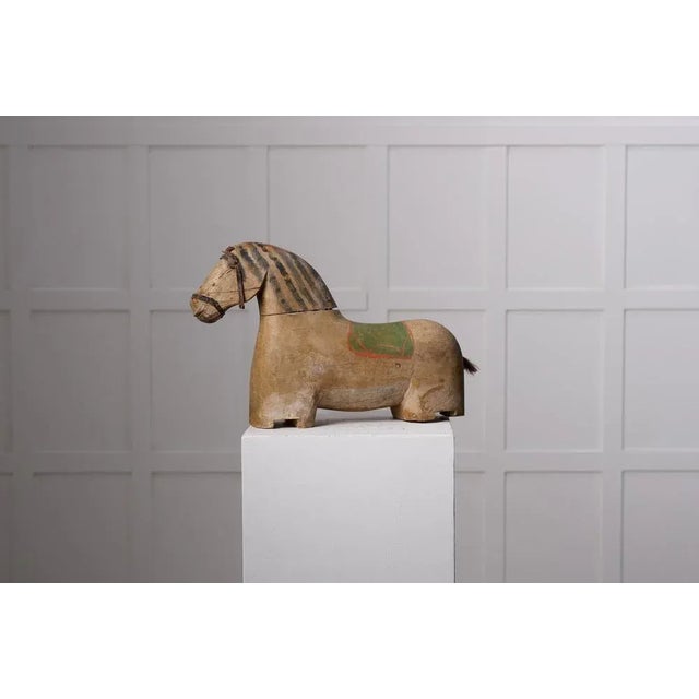 Antique wooden horse sculpture from northern Sweden. The horse is from around 1850 and has a body in pine with original...