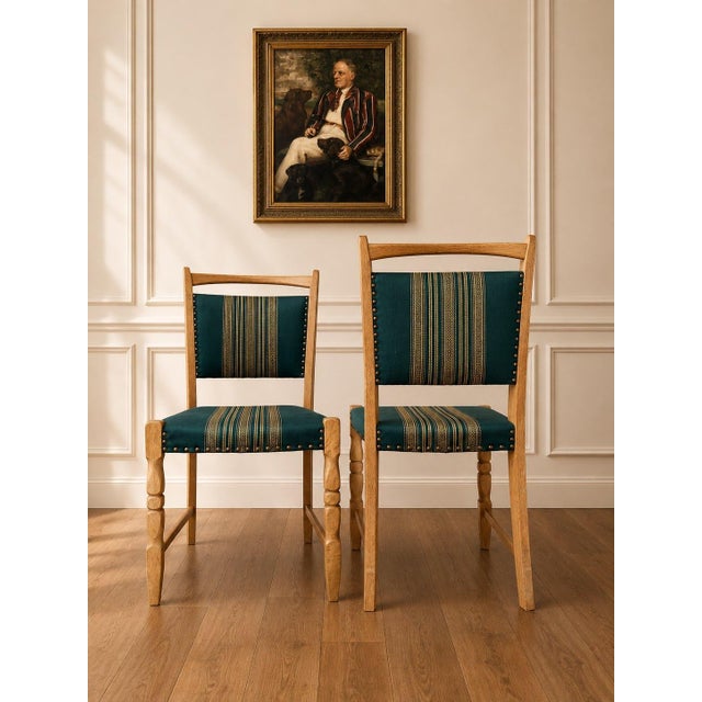 Set of Four Danish Oak Dining Chairs in the Style of Henning Kjærnulf, Denmark, circa 1970s Description: A charming set of...