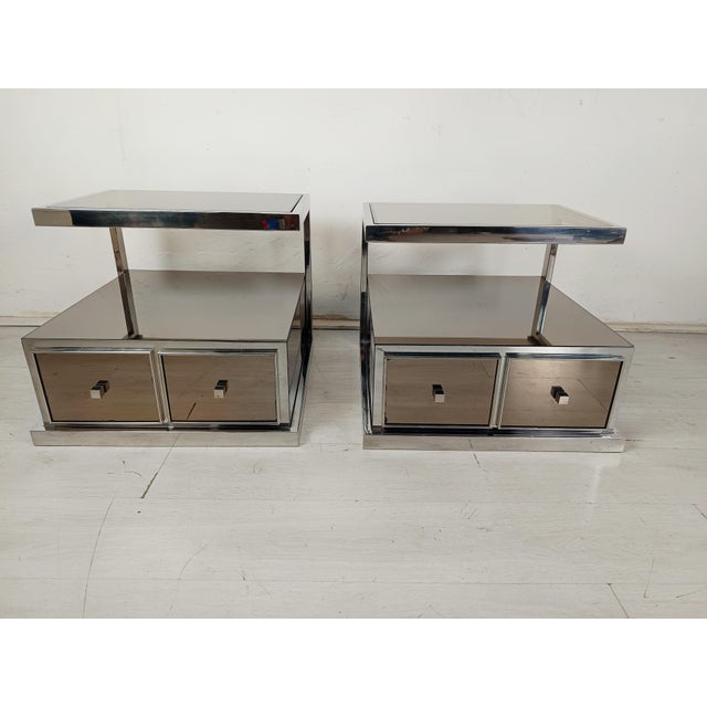 The bedside tables are not exactly the same height 48 and 50cm This piece has an attribution mark, I am sure that it is...