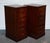 Antiques of London We are delighted to offer for sale these Stunning Pair of Hardwood Burgundy Leather Filing Cabinets. A...