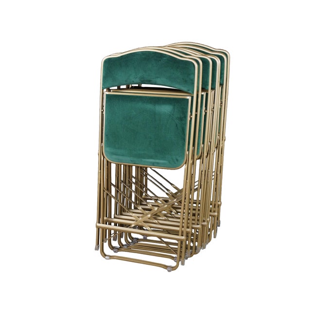 This vintage set of eight A. Fritz + Co. folding chairs seamlessly blends practical, space-saving utility with a glamorous...