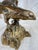 Bring timeless craftsmanship and dramatic movement to your home with this vintage solid cast brass eagle sculpture....
