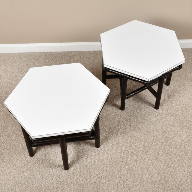 Luxurious vintage 1950s Ficks Reed hexagon side tables. The Ficks Reed "Far Horizons" collection by John Wisner was...