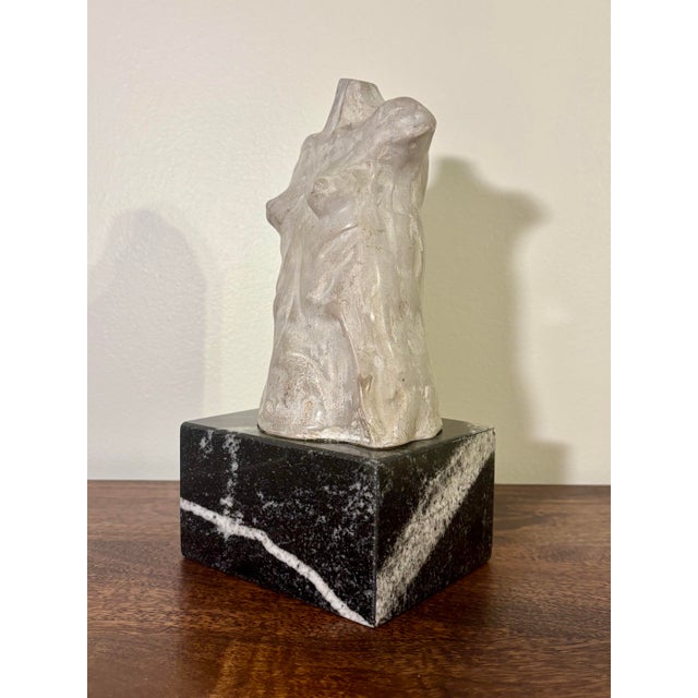 A striking mid century modern American studio ceramic bust depicting the female torso in abstracted form. Rendered in a...