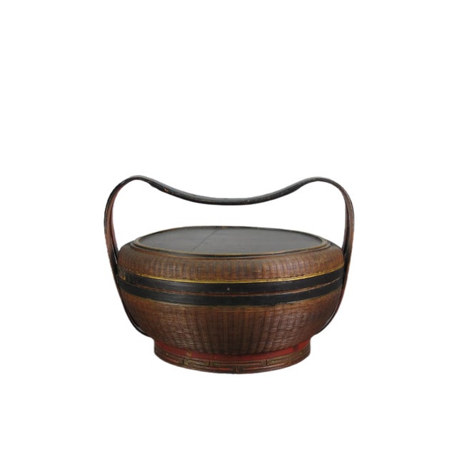 This bamboo basket is a beautiful and unique piece that showcases expert craftsmanship. Handmade from fine and delicate...