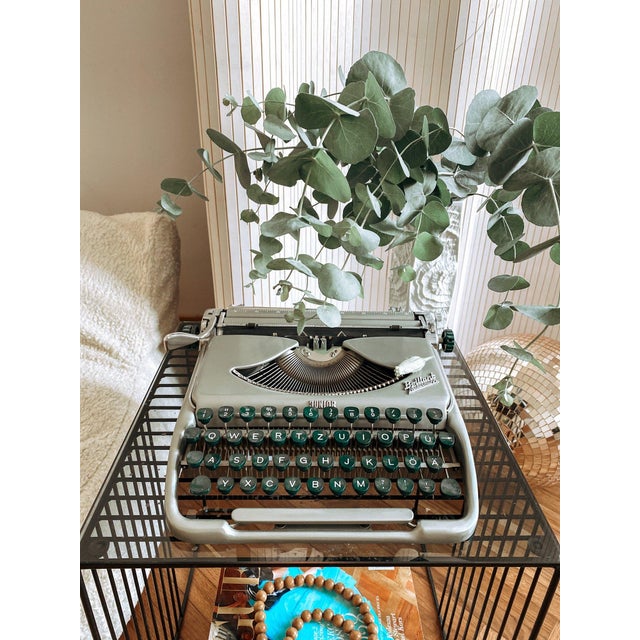 This Brillant Junior portable typewriter was manufactured in the late 1950s by VEB Groma in Markersdorf, East Germany, and...