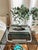 This Brillant Junior portable typewriter was manufactured in the late 1950s by VEB Groma in Markersdorf, East Germany, and...