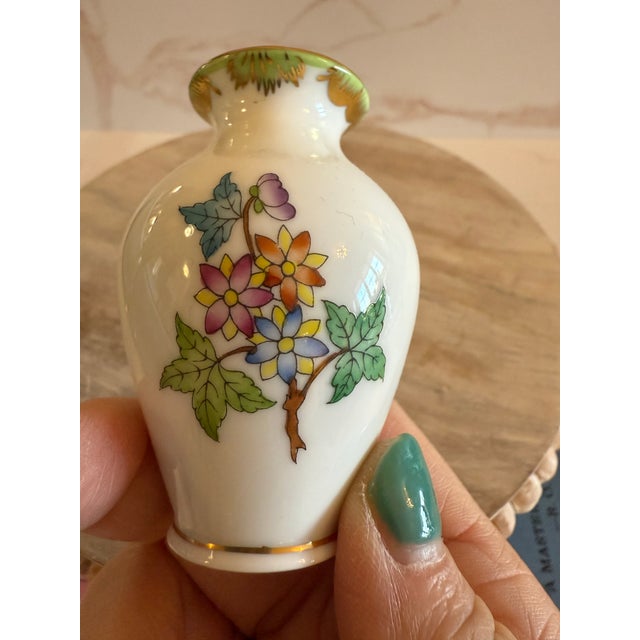 A rare delight in diminutive form, this petite Herend vase (2" x 2.5") showcases the iconic Queen Victoria pattern—vibrant...
