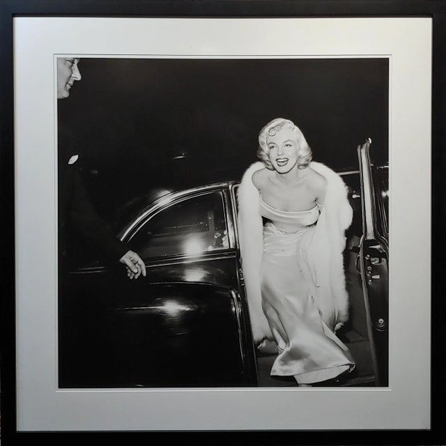 Marilyn Monroe at 1954 Premier -Large Silver Gelatin Photograph by Murray Garrett Marilyn Monroe wearing a strapless white...