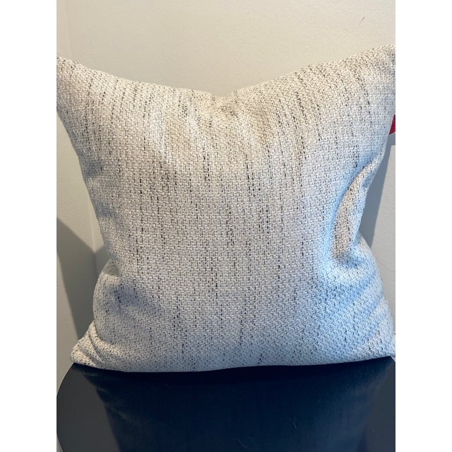 Elevate your interior design with this sophisticated, textured throw pillow, which features a refined ivory and charcoal...