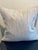 Elevate your interior design with this sophisticated, textured throw pillow, which features a refined ivory and charcoal...