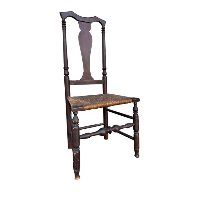Bring home a true piece of early American craftsmanship with this 18th‑century Queen Anne country chair, featuring its...