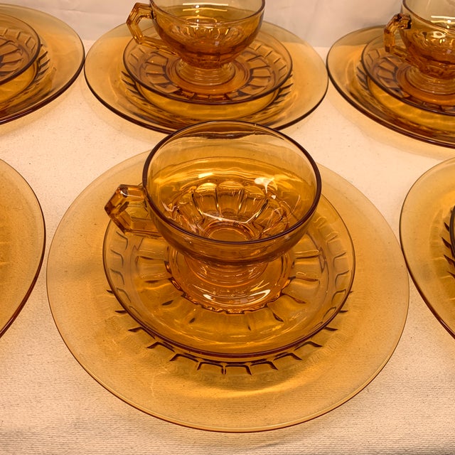 This 1930s amber depression glass luncheon set is the "Newport" pattern (also known as Line #34 or Addie) manufactured by...