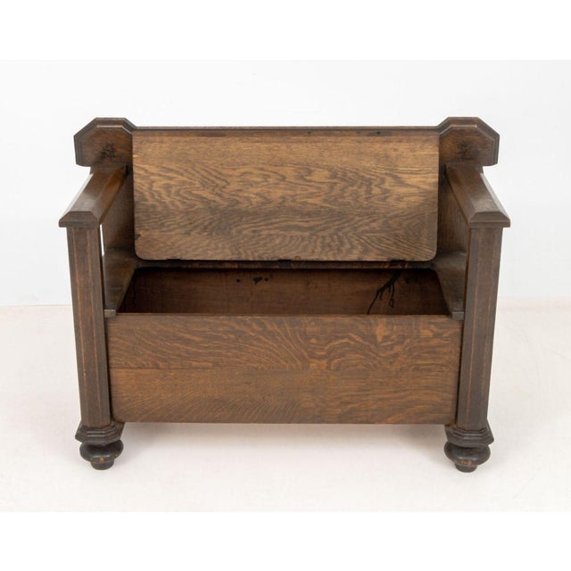 Arts and Crafts Oak Hall Bench, early 20th century, with lift-top seat storage compartment. 32.25" H x 42" W x 21" D....