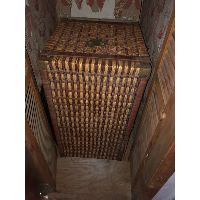 A beautiful, large-scale vintage hand-woven wicker storage trunk that perfectly balances organic texture with functional...
