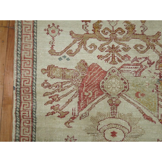 An early 20th-century antique Turkish Ghiordes rug. 4' x 5'9''