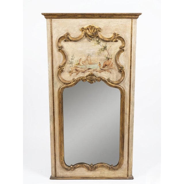 This exquisite vintage trumeau mirror captures the elegant essence of French Neoclassical design. The wooden frame...