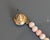 Even sized beads with varying colors between pink and off white coral. Hence the name of this coral of angl skin. Nice...