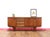 Discover the timeless elegance of the Mid Century Modern Vintage Teak Sideboard Credenza in the style of British furniture...