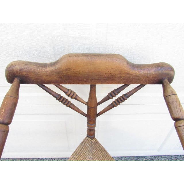 Antique English triangular chair, sometimes called a knitting chair, with unobtrusive slanted arms, c.1900 Made of...