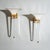 Pair of wall lights in clear glass with white shades and gold-colored accents. The reverse bears the label “Sigma L2 Paolo...