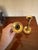 This listing is for a pair of vintage, solid brass, heavy candlestick holders. Each measures 7 3/8" T x 3.75" W