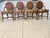 Set of Four Vintage Bamboo & Rattan Cane Back dining chairs. McGuire Style Dining Chairs. They feature a distinct oval-...