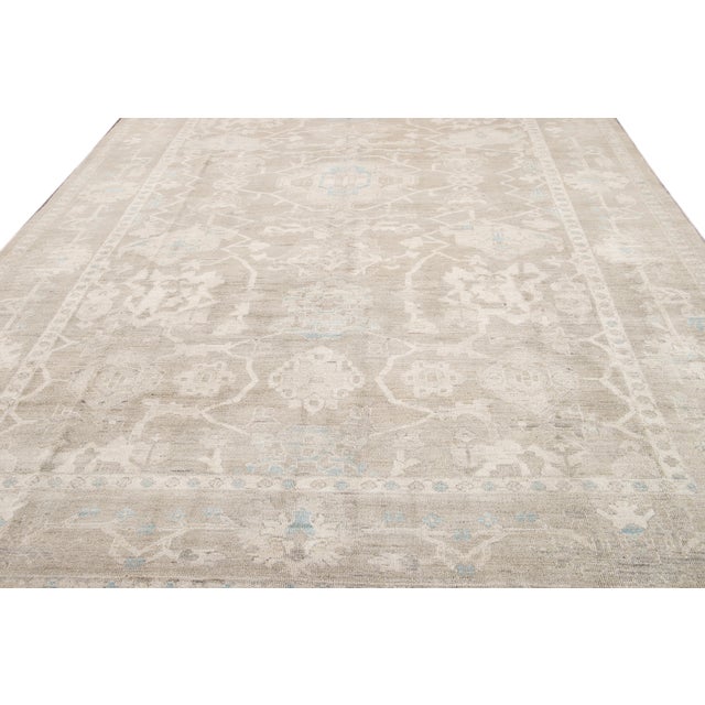 This contemporary rug combines timeless elegance with modern design. Crafted from premium Sultanabad wool, it features a...