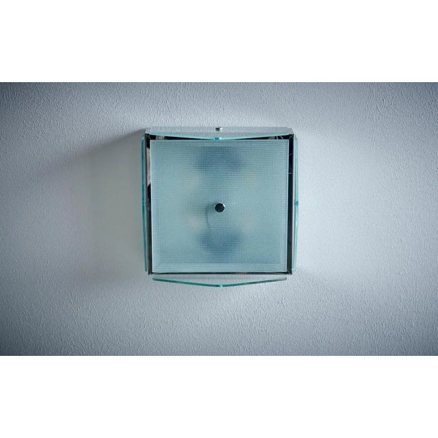 1960s Design Italian Wall Lamp nos in clear glass. Up to 250V (Europe/UK Standard).The wiring of this item may be original...