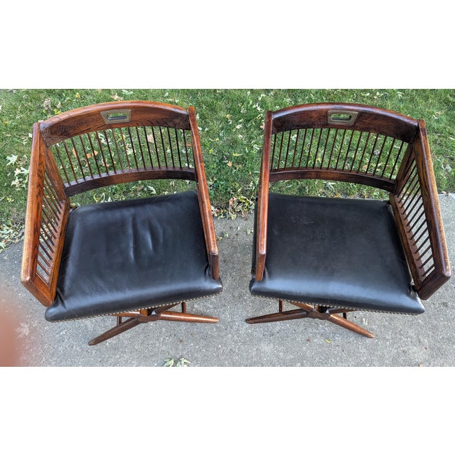 Beautiful set of 1940's Bankers /Campaign wood chairs. They have. solid wood back around the top with decorative spindles...