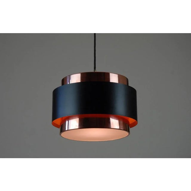 This lamp was the focus of Hammerborg's 'Saturn Series'. Concept, was a structure of two concentric cylindrical bands,...