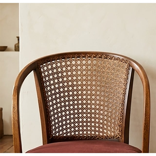 This rare and exceptionally beautiful antique armchair is a true testament to early 20th-century English craftsmanship....
