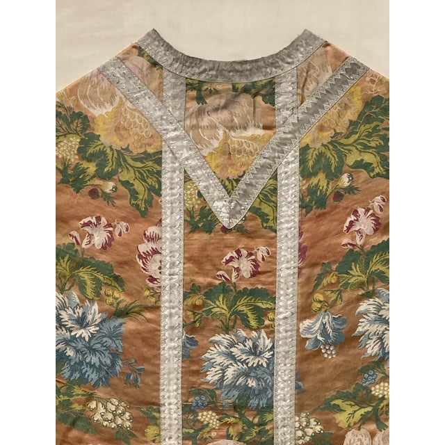 Offering a remarkable antique ecclesiastical vestment featuring finely woven polychrome floral silk, probably of Lyonnaise...