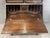 An impressive antique solid mahogany secretary bookcase made by the Colonial Manufacturing Company of Zeeland, Michigan....