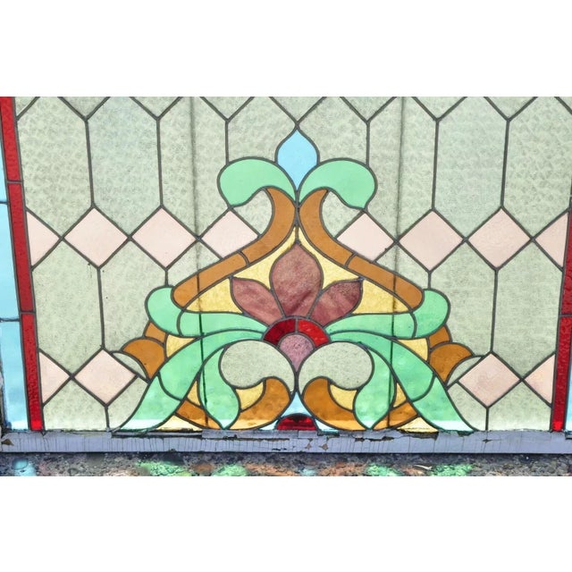 Antique Art Nouveau Stained Glass Blue, Green, Pink, Orange Fleur De Lis 34x40 Window. Item features blue and red stained...