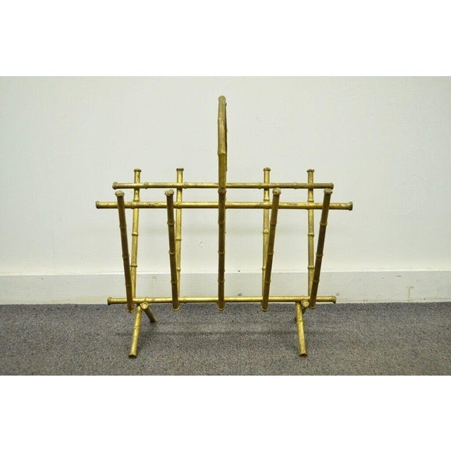Vintage Italian Hollywood Regency Gold Gilt Metal Faux Bamboo Magazine Rack. Circa Mid 20th Century. Measurements: 19.5" H...