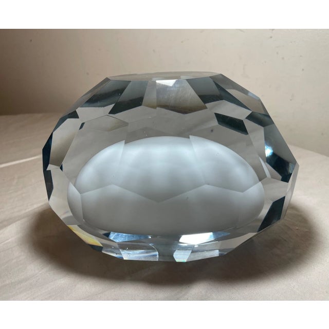 This stunning sculpture is a true masterpiece. Crafted by skilled artisans, it features a large, heavy white clear glass...