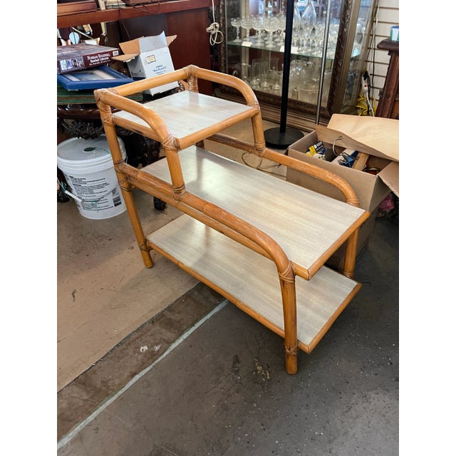1950s , Mid Century pair of side tables. Three tier bent bamboo frame with formica top. Great items for a Hollywood...