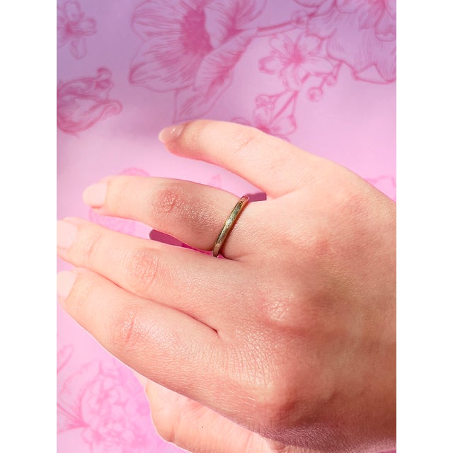 About This Ring: Introducing this one of a kind Retro Two Tone Gold Band! Impeccably crafted from 14k white and yellow...