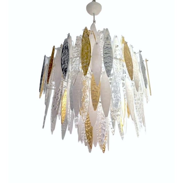 Mid-century modern Italian Murano glass hanging chandelier, entirely handmade in Italy in the 20th century and designed in...