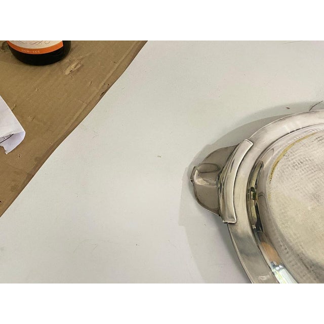 Siver Metal Plated . from the are deco period, around 1940. It is an Oval shape, with handles, which allow this tray to be...