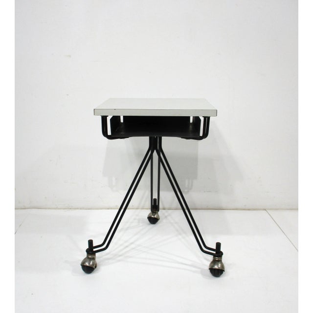 A great smaller sized work table for a laptop , gaming or just a portable table for any room , used by IBM as a Telephone...